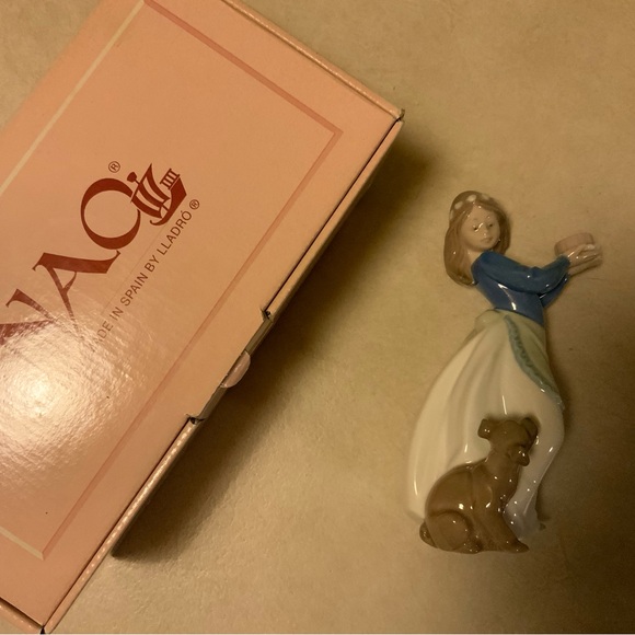 Blue and White Porcelain Girl with Dog Figurine